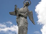 Ecuador Quito 06-03 Old Quito Virgin Mary Close Up On El Panecillo The Virgin Mary stands on top of a globe, stepping on a snake. Strangely she has wings like an angel. This statue was based on a sculpture made by Bernardo de Legarda in 1734, the famous 